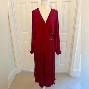 NWT stunning burgundy dress with pleated skirt and gold button accents. Size L